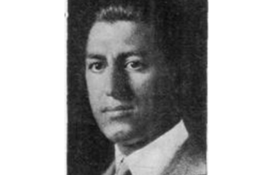 Morris J. Escoll in a suit, black and white