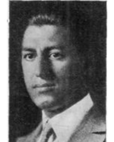 Morris J. Escoll in a suit, black and white